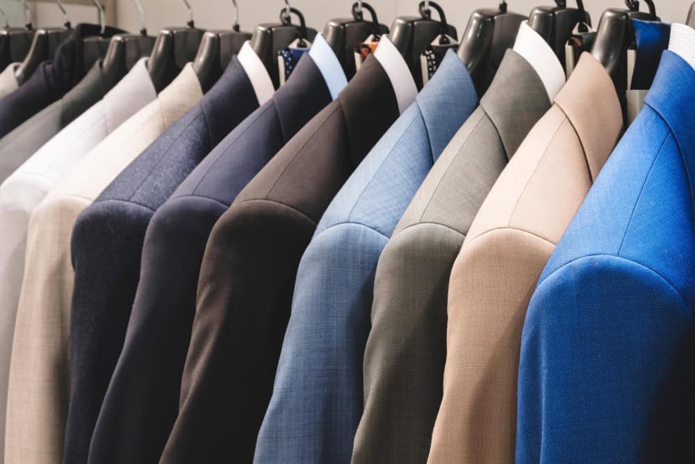 A rack of tailored suits