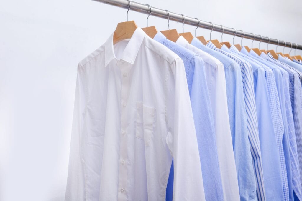 A rack displaying men’s business shirts