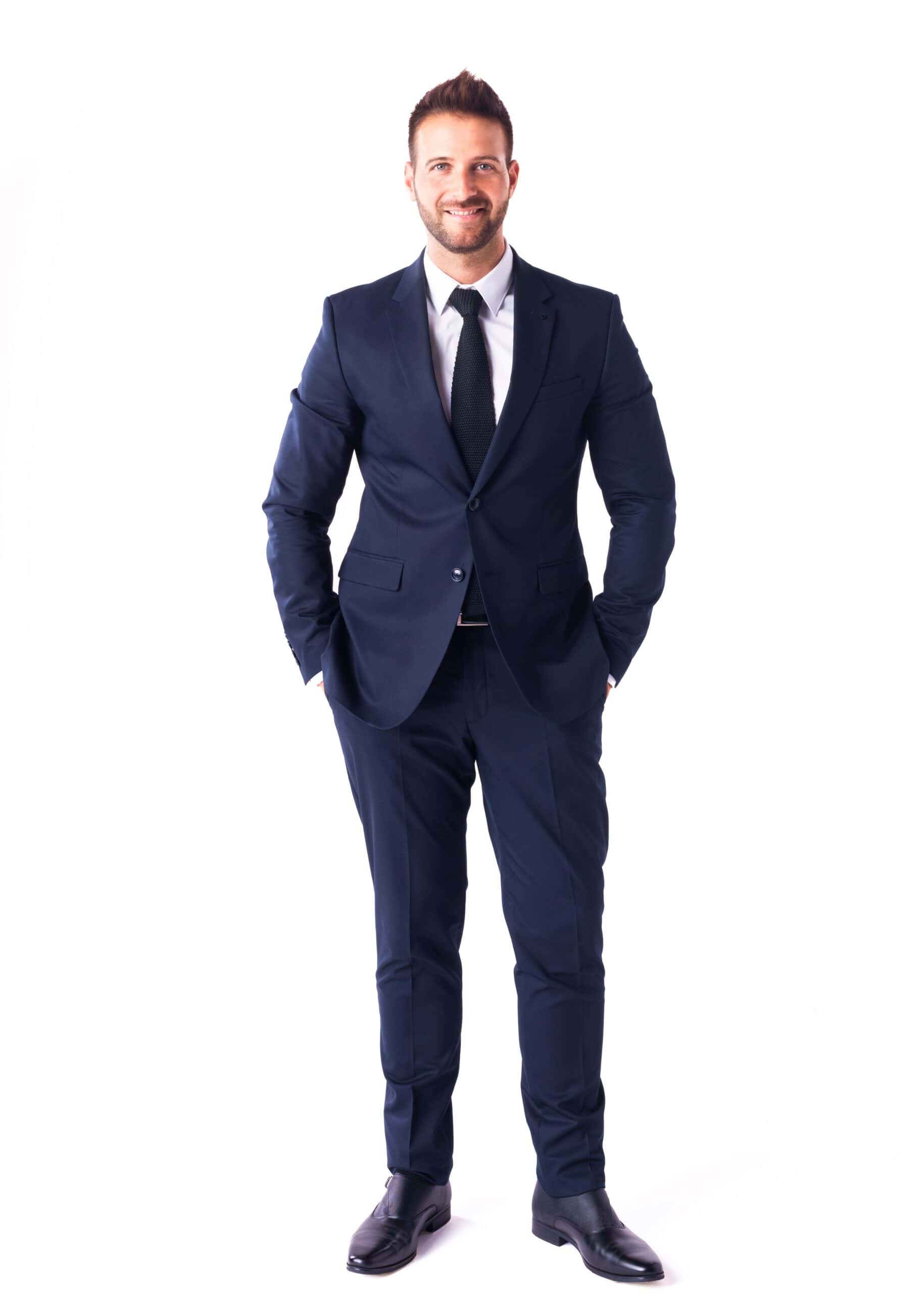 A man wearing a fully tailored suit