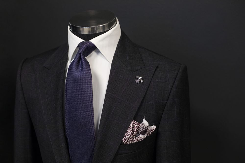 A custom-tailored suit. A good suit makes it easier to know how to look expensive as a man.