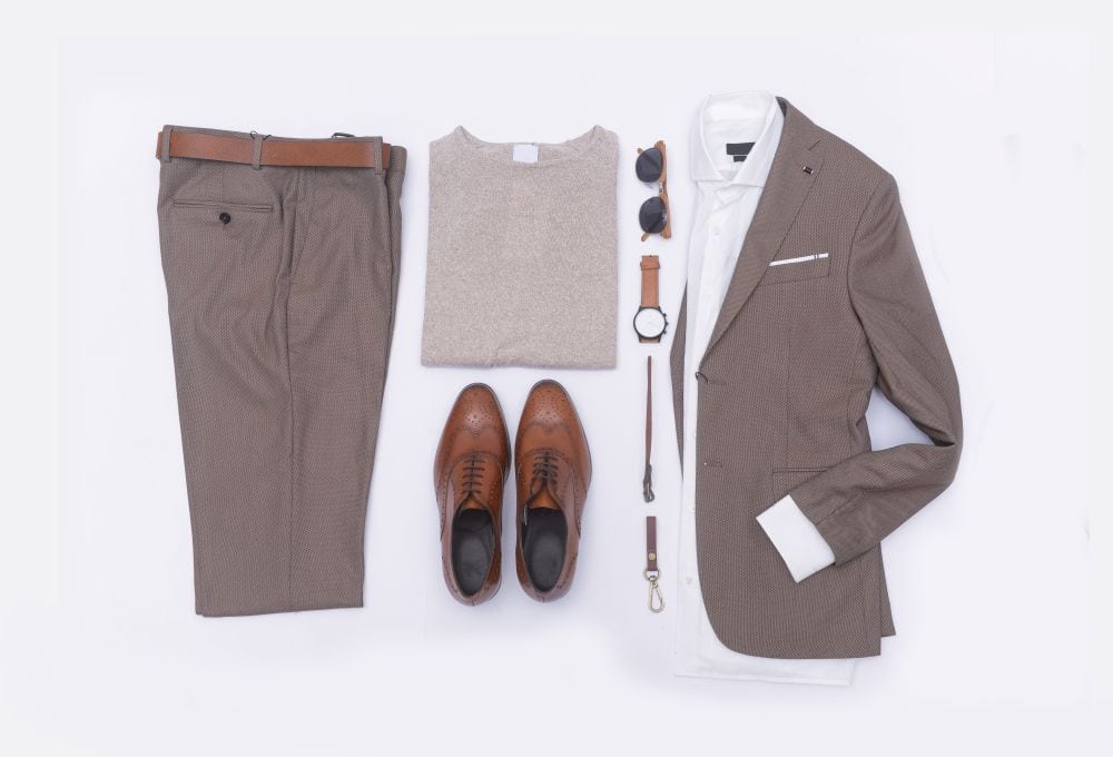 Men’s suit and trousers with accessories and shoes. A good look should flow together.